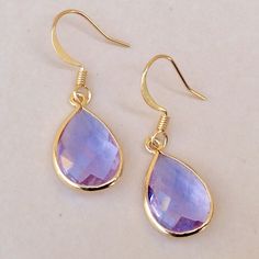 Gorgeous Earrings New In Excellent Condition 1.5” L Total With Gold Plated Ear Wires, 0.4”W Gold Plated Metal Pear Shape Bezel Purple Tone Faceted Hydro Quartz Stones 18mm-11mm Beautiful, Not Heavy, Many Compliments Guaranteed Fast Shipping. & Anthropologie Gift Bag New 10”-8”-5” Bundle Up And Save Even More. Fast Shipping Elegant Purple Earrings For Everyday, Everyday Purple Jewelry With Ear Wire, Everyday Purple Earrings With Ear Wire, Everyday Purple Drop Earrings, Everyday Hypoallergenic Purple Earrings, Everyday Purple Dangle Earrings, Purple Dangle Teardrop Earrings Gift, Purple Teardrop Earrings With Natural Stones, Amethyst Gemstone Teardrop Earrings Gift