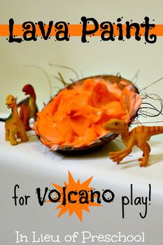 an orange plate with plastic dinosaurs on it and the words lava paint for volcano play