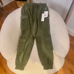 -Army Green Lightweight And Super Comfortable Joggers -Cargo Pockets Throughout -Pull On Elastic Waist With Drawstring -Loose Fit Through The Leg -Soft Corduroy Fabric -Elastic Bottom -24” Waist When Not Stretched -100% Poly -Nwt Casual Forever 21 Bottoms With Cargo Pockets, Casual Fall Bottoms From Forever 21, Forever 21 Casual Bottoms For Fall, Forever 21 Casual Streetwear Bottoms, Forever 21 Cargo Pants With Pockets For Spring, Forever 21 Casual Cargo Pants For Spring, Casual Cotton Pants By Forever 21, Forever 21 Casual Spring Cargo Pants, Forever 21 Casual Cotton Pants