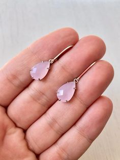 Rose Quartz Earrings, Pink Teardrop Earrings, Blush Pink Earrings, Small Dangle Earrings, Rose Quartz Gold Jewelry, Gift for Mom, Girlfriend These small but gorgeous earrings feature soft pastel pink rose quartz faceted teardrops bezel framed in gold filled. The teardrops are suspended from gold filled lever back ear wires. These are understated, delicate and dainty earrings but with a gorgeous soft and neutral color sure to match many outfits. Ideal for a girl or a women that likes light weight Feminine Teardrop Earrings For Gifts, Feminine Teardrop Earrings As Gift, Pink Dangle Teardrop Earrings For Gift, Pink Drop Earrings With Ear Wire, Pink Long Drop Earrings As Gift, Rose Gold Pierced Teardrop Earrings For Gift, Pink Hypoallergenic Teardrop Earrings, Feminine Rose Gold Teardrop Earrings, Delicate Rose Gold Drop Earrings