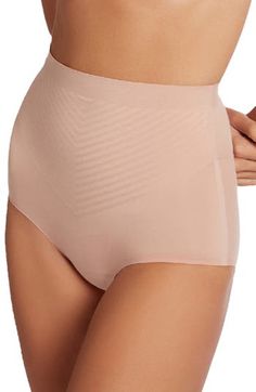 Sleek lines subtly sculpt the waist and stomach in these stretch-cotton shaping briefs that remain seamless and invisible under outfits. Lined gusset 69% cotton, 31% elastane Machine wash, line dry Made in Croatia Stretch Cotton, Briefs, Croatia, High Waist, Size 4, Sleek, Nordstrom, High Waisted