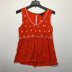 This Listing Is For A - Nwt Sanctuary Women Sleeveless Embroidered Tank Top Blouse Shirt Size Large Condition: New With Tags See Pictures For Measurements & Any Additional Material Details. Casual Embroidered Tank Top For Summer, Embroidered V-neck Tank Top For Spring, Casual Embroidered Fitted Tank Top, Orange Embroidered Tops For Summer, Casual Cotton Tank Top With Floral Embroidery, Embroidered Sleeveless Fitted Top, Casual Embroidered Tank Top For Spring, Sleeveless Floral Embroidery Vacation Blouse, Casual Sleeveless Blouse With Floral Embroidery