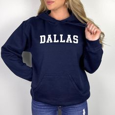 Show your love for Dallas Texas with this design that features Dallas in a classic style.  GILDAN 18500 PULLOVER HOODIE  * Super comfortable unisex heavy blend pullover hoodie  * 50% cotton, 50% polyester  * Pre-shrunk  * Classic fit  * Runs true to size  * Air-jet spun yarn with a soft feel and reduced pilling  * Double-needle stitched collar, shoulders, armholes, cuffs and hem      HOODIE SIZING IN INCHES  S = 20" Width x 27" Length x 33.5" Sleeve  M = 22" Width x 28" Length x 34.5" Sleeve  L Fan Gear Hoodie, Fan Apparel Hoodie With Ribbed Cuffs, Game Day Hoodie With Drawstring, Cotton Fan Apparel Hoodie With Kangaroo Pocket, Cotton Fan Apparel Hoodie, Cotton Hoodie With Adjustable Hood For Fans, Fan Apparel Cotton Sweatshirt With Kangaroo Pocket, Fan Apparel Cotton Hoodie With Drawstring, Cotton Fan Apparel Sweatshirt With Kangaroo Pocket