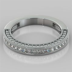 a wedding band with rows of diamonds on the inside and outside, set in 18k white gold