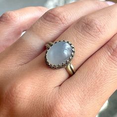 Elegant distinctive vintage ring in bronze with a very pretty Natural Grey Moonstone in a filigree oval bed. The ring has an antique look. The ring is made of Brass in bronze color, adjustable, fits every finger circumference. The basic size is 56 (US 7.5). Nice small cute Gift box and also small Jewelry Gift is included. oooooooo          ... UNIQUE JEWELRY FOR UNIQUE WOMAN ... oooooooo Details: oº Adjustable size: Basic size is 56 mm, US 7.5 oº Semi-precious gemstone - Natural Grey Moonstone o Vintage Oval Cabochon Moonstone Jewelry, Antique Gold Moonstone Ring Oval Cabochon, Antique Oval Cabochon Moonstone Ring, Antique Moonstone Oval Cabochon Ring, Antique Oval Filigree Ring Gift, Antique Moonstone Ring, Oval Cabochon, Antique Gold Moonstone Ring With Oval Cabochon, Vintage Moonstone Gemstone Ring, Victorian Oval Cabochon Moonstone Ring