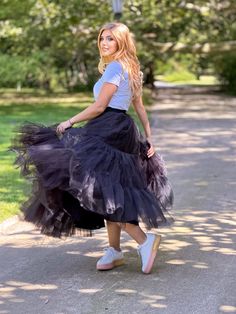 This Black dance skirt is an absolute must-have for any fashion-forward woman! The vibrant colors and comfortable fit make it ideal for any occasion. Whether you're hitting the road or enjoying a picnic in the park, this skirt is sure to turn heads. Black Ruffled Tulle Skirt crafted from 100% cotton base fabric and adorned with two layers of black tulle ruffles. The waistband features a soft and comfortable elastic, making it suitable for extended wear. Elevate your wardrobe with this unique tulle skirt, adding a touch of style and grace to your look. Perfect for special occasions and everyday wear. **The model in the picture is 170 cm tall and is wearing a skirt in size S US, with a length of 95 cm. The skirt is easy to care for, as it can be machine washed and ironed to your liking, ensu Black Tulle Skirt For Fall, Black Tulle Flared Skirt, Black Flared Tulle Skirt, Fitted Black Tulle Skirt, Black Stretch Tulle Skirt, Black Tulle Bottoms For Night Out, Black Flowy Tulle Maxi Skirt, Black Tiered Tulle Skirt, Fitted Black Tiered Maxi Skirt