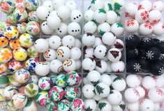 there are many different types of beads in the box on this table and one is white