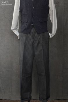 Made in British wool. Loose fit chino with straight leg and high rise. Features zip fly with a buttoned closure, front angled pockets, a right hip coin pocket and two back buttoned pockets. Made in Italy Brand: Scarti-Lab Size 30: waist 32", inseam: 30 1/2", bottom opening: 17" Size 32: waist 34", inseam: 30 1/2", bottom opening: 18" Size 34: waist 36", inseam: 31", bottom opening: 19" Size 36: waist 38", inseam: 31", bottom opening: 20" Classic Pinstripe Dress Pants With Welt Pockets, Classic Pinstripe Bottoms For Business Casual, Classic Straight Leg Winter Bottoms, Tailored Pinstripe Pants With Belt Loops, Pinstripe Tapered Leg Dress Pants With Welt Pockets, Classic Pinstripe Pants For Business Casual, Tailored Full-length Work Pants With Pockets, Tailored Pinstripe Tapered Leg Pants, Tailored Pinstripe Dress Pants With Tapered Leg