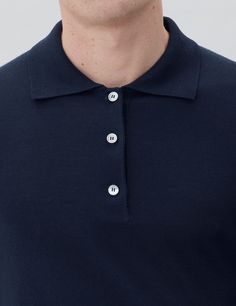 Distinguished by impeccable craftsmanship, our long sleeve Cotton Knit Polo has endless styling potential and lays the foundation for a well-stocked wardrobe. It has a supremely soft handle and comfortable regular fit; finished with ribbed trims, charcoal natural Mother of Peal buttons.

A light-weight knit made from our premium Flamed Mercerized Peruvian Pima cotton yarn, which gives the piece its lustrous appearance. The Mercerization process also increased fiber strength and affinity to dye,