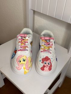 Let me custom paint some shoes for your little one! Send me a pair of sneakers or other leather/vegan leather shoes, let me know what design you have in mind, and I will customize them just for you! The perfect gift for your little one. Send me a message for all the details! Fun White Sneakers With Custom Artwork, Multicolor Custom Artwork Sneakers With Round Toe, White Round Toe Sneakers For Gift, Custom Multicolor Round Toe Sneakers, Customizable Pink Sneakers As A Gift, Customized Round Toe Sneakers, Custom Artwork Leather Sneakers With Round Toe, Customizable Cute Low-top Sneakers, Hand Painted Round Toe Sneakers For Fun