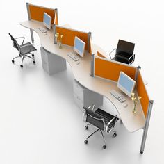 an office cubicle with two desks and three computers on each side, along with a chair