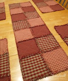 red and white checkered placemats sitting on top of a wooden table