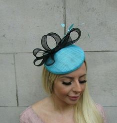 This hat is perfect for special occasions.Featuring turquoise blue sinamay and black detailing with feathers and 16cm base. This comes on a headband but can be swapped onto clips or hat elastic instead on request. One off piece - only one available!Many more items like this are available in our shop! Beaded Hair Combs, Kinds Of Hats, Turquoise Hair, Fascinator Hairstyles, Black Turquoise, Rose Hair, Feathered Hairstyles, Burgundy Wine, Flower Clip