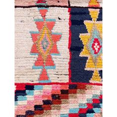 multicolored rugs are arranged on top of each other, with different shapes and sizes