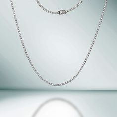 The Diamond Tennis Necklace is a stunning piece of jewelry that features a total of 8.05 carats of high-quality diamonds set in 14K gold. Each diamond is secured by a 4-prong setting, ensuring that they are held securely in place and allowing them to shine brilliantly. The diamonds are carefully selected for their exceptional quality, all our diamond are 100% natural. The necklace is designed with a delicate chain that sits elegantly around your neck, making it the perfect accessory for any occasion. Whether you're looking to add some sparkle to your everyday wear or to make a statement at a special event, this Diamond Tennis Necklace is sure to impress. It's a timeless piece that will be cherished for years to come. PRODUCT DETAILS: Metal Type: 14K Gold Gold Weight: 15.50 gr. Diamond Weig Beautiful Diamond Necklace, Diamond Tennis Necklace, 14k Yellow Gold Necklace, White Gold Necklaces, Tennis Necklace, Natural Earth, Travel Jewelry, Diamond Sizes, Box Chain