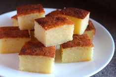 several pieces of cake on a white plate