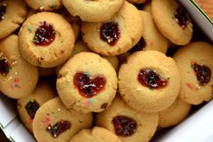 a box filled with cookies covered in jelly