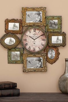 there is a clock on the wall with many frames around it and two vases