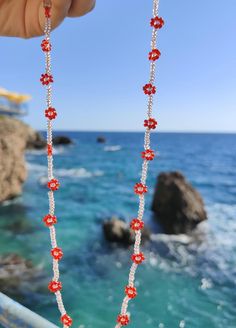 Red Daisy Beaded Necklace 🤍 Cute Red Charm Necklaces For Gifts, Valentine's Day Beaded Party Necklace, Cute Red Charm Necklace For Gift, Beaded Flower Necklace For Summer Gifts, Trendy Flower Necklace For Gifts, Trendy Flower Necklace As A Gift, Trendy Flower Necklace For Beach, Trendy Flower-shaped Beach Necklace, Valentine's Day Necklaces With Colorful Beads