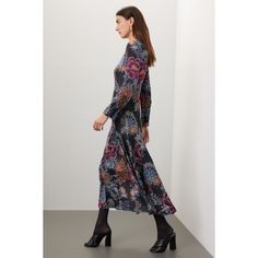 Black floral satin (52% Viscose, 48% Rayon). A-line. Long sleeves. Crewneck. Front zipper closure. 55" from shoulder to hemline. Imported. Floral Print A-line Midi Dress For Evening, Black A-line Floral Dress, Evening A-line Midi Dress With Floral Print, Fall Printed A-line Midi Dress, Floral Print Fit And Flare Midi Dress For Evening, Printed A-line Midi Dress For Fall, Evening Floral Print Fit And Flare Midi Dress, Fall Evening Maxi Dress With Floral Print, Formal Multicolor Floral Print Midi Dress