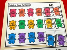 the bear pattern worksheet is on top of a binder with matching stickers