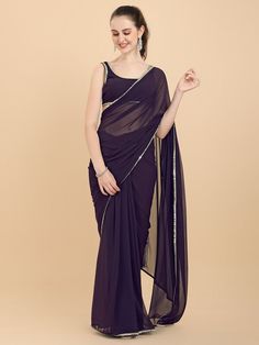 Mauve and silver-toned sareeSolid saree with embellished borderHas mirror work detailThe saree comes with an unstitched blouse pieceThe blouse worn by the model might be for modelling purpose only. Check the image of the blouse piece to understand how the actual blouse piece looks like. Silver Pre-draped Saree With Sheer Dupatta, Silver Pre-draped Saree With Mirror Work, Silver Pre-draped Saree With Mirror Work For Diwali, Formal Georgette Saree With Mirror Work, Silver Georgette Saree With Mirror Work, Formal Saree With Mirror Work, Silver Bollywood Georgette Saree, Silver Party Wear Saree With Traditional Drape, Silver Saree With Traditional Drape For Party