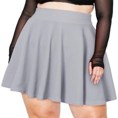 Look your best this season with this stylish high waisted skater skirt! This plus size skirt features a classic grey hue with a flattering fit. Gray Stretch Mini Bottoms, Stretch Mini Length Solid Color Tennis Skirt, Stretch Mini-length Tennis Skirt In Solid Color, Stretch Mini Tennis Skirt In Solid Color, Mini Length Stretch Tennis Skirt In Solid Color, Spring Fitted Gray Tennis Skirt, Gray Stretch Skirted Bottoms, Fitted Gray Mini Skirt Casual, Gray Fitted Mini Skirt Casual Style