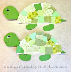 two paper turtles made to look like they are cut out of pieces of paper and placed on top of each other