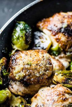 chicken and brussel sprouts in a skillet