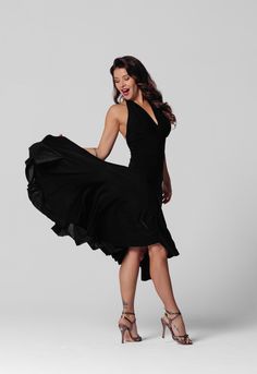 Make a statement on the dance floor with this elegant black tango dance dress. Designed with a halter neck and an open back, this dress brings a sense of allure to your dance routine. The top features a double-layered design, giving you the option to insert cups for added comfort and support. Its unique flared hem with panels adds a dynamic touch, moving gracefully with every step. The high-quality, stretchy fabric ensures ease of movement while the asymmetric hemline enhances the dramatic flair of your performance. This dress is the epitome of sophistication, perfect for passionate tango performances or elegant social dance events. Elevate your dance wardrobe with this exquisite piece. INDIVIDUAL TAILORING (DISCUSSED BEFORE ORDERING) You can order individual tailoring from us. We will be Figure Skating Tango Dress, Tango Dress Aesthetic, Black Tango Dress, Tango Argentino Dresses, Tango Dance Dress, The Tango Dance, Social Dance, Dance Event, Tango Dance