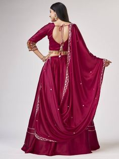 Introducing our amazing maroon gamthi work silk navratri wear lehenga choli, made with maroon satin silk material. This stunning ensemble is perfect for traditional occasions like Navratri, where you want to look elegant and festive.
Let's talk about the benefits of this beautiful lehenga choli. It is made with high-quality satin silk material, ensuring a smooth and comfortable fit. The maroon color adds a touch of sophistication and grace to the overall look. The gamthi work on the choli and at Bollywood Style Silk Sharara For Navratri, Art Silk Palazzo Set With Mirror Work For Navratri, Silk Lehenga With Gota Work For Navratri, Navratri Art Silk Palazzo Set With Traditional Drape, Silk Choli For Navratri Festival, Silk Choli For Festive Navratri, Festive Silk Choli For Navratri, Navratri Art Silk Palazzo Set With Pallu, Navratri Traditional Drape Art Silk Palazzo Set