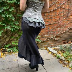 "This gorgeous skirt accentuates a woman's curves.  A dramatic skirt to wow, with great movement for dancing. Two tiered ruffle skirt with variegated hem line. Fit and flare style which is flattering on most body shapes.  Made from a pair of quality stretchy cotton corduroy dress pants.    Featuring 4 functional pockets, 2 on back side and 2 on the hips.  Soft to touch and navy blue with beige undertones.  Size Medium Waist 31\"-32.5\" Hip 39\"-42\" Length:  Front: 20\" Back: 35\" This is a zero Fashion Avant Garde, Cascade Skirt, Dramatic Skirt, Haute Couture Style, Upcycled Dress, Tiered Ruffle Skirt, Corduroy Dress, 1920s Fashion, Steampunk Fashion