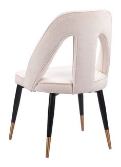 a white chair with wooden legs and an armrest that has a curved design on it