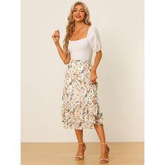 Featuring pretty ditsy floral prints, this midi skirt is a summer option that can be worn with just about anything. Channel elegant style in this midi skirt which is beautifully printed with a blossom pattern for a versatile look. It is made of lightweight fabric, adding definition to the free-flowing design. Falling to a waterfall midi hem, it sits high on the waist with a discreet side zip fastening. Summer days call for effortlessly feminine styles like skirts. Flowy Midi Skirt, Skirt Chiffon, Skirts White, Ruffle Fabric, Printed Skirt, Slip Skirt, Floral Print Skirt, Free Flowing, Midi Skirts