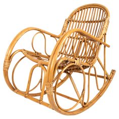 a wicker rocking chair is shown against a white background