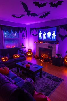 a living room decorated for halloween with purple lighting