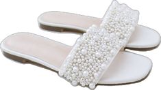 Elegant Summer Wedding Guest Shoes, Elegant Open Toe Pearl Wedding Shoes, Flat Wedding Shoes For Summer Evenings, Elegant Pearl Sandals For Party, Summer Evening Flat Wedding Shoes, Elegant Wedding Sandals For Summer, Elegant Pearl-embellished Open Toe Sandals, Elegant Summer Sandals For Bridal Shower, Elegant Sandals For Bridal Shower In Spring