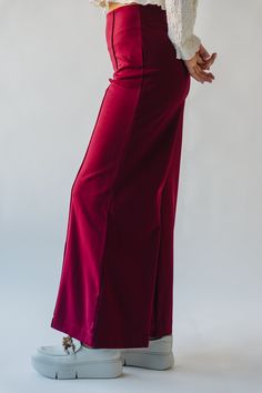 Elevate your style game with The Cardinale Wide Leg Flare Trouser in Burgundy. These pants feature a flare silhouette, offering a flattering fit while making a bold statement. The burgundy color adds a touch of sophistication to any outfit. Perfect for those who want to stand out from the crowd! Details self/lining: 100% polyester Fabric Care Guide Here Sizing & Fit Measurements are approximate and taken while laying flat across the front. Not doubled. small: waist = 12"; length = 40.5" ; inseam Elegant Burgundy High-waisted Wide Leg Pants, Chic Burgundy Wide Leg Trousers, Chic Burgundy Wide Leg Pants, Chic Burgundy High-waisted Wide Leg Pants, Elegant Red Flare Bottoms, Elegant Burgundy Wide Leg Pants, Chic Stretch Burgundy Bottoms, Burgundy Wide Leg Bottoms For Night Out, Burgundy Stretch Pants For Night Out