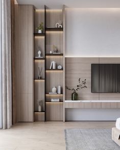 a living room filled with furniture and a flat screen tv on top of a wooden shelf