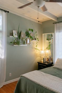 Sage Green Bedroom and Bedding - White accents - Plant Wall - Capiz Shell Lamp - White Ceiling - Wood Flooring Light Green Rooms, Green And White Bedroom, Green Room Decor, Green Accent Walls