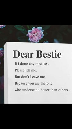 a piece of paper with the words dear bestie written on it next to some flowers