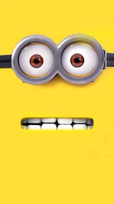 a close up of the eyes of a minion from despicable me on a yellow background