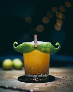 a drink with a mustache on the top