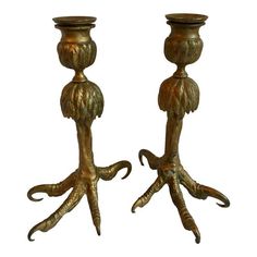 pair of brass candlesticks with octopus legs