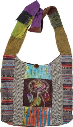 A hippie style cotton handbag with a colorful wolf dreamcatcher print, razor cut details and thick dari cotton fabric.  This bag is a fresh style in hippie bohemian clothing; the back of the bag is one color stonewashed fabric. #tlb #Stonewash #vacationclothing #Printed #bohemianfashion #BohemianBag #CrossBodyBag #Handmadehandbag Summer Bohemian Cotton Hobo Bag, Everyday Bohemian Cotton Hobo Bag, Bohemian Cotton Hobo Bag, Casual Cotton Hobo Bag For Festival, Bohemian Cotton Hobo Bag For Festival, Hippie Style Cotton Bags For Everyday, Bohemian Cotton Hobo Shoulder Bag, Hippie Cotton Bags For Everyday Use, Handmade Hippie Shoulder Bag For Festival