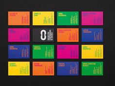 six different colored business cards on a black background