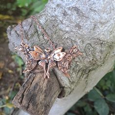 Handcrafted and kiln fired from home! This Triple moon goddess moth necklace is completely handmade and is great for any nature and moon lover or those who love the triple moon goddess symbolism. It has been created from sustainable copper metal clay and sculpted with tools by hand.  SYMBOLISM: The triple moon goddess  3 figures described as the maiden, the mother and the crone, symbolising the different phases of a womanhood, from the playfull maiden to the nurturing mother to the wise crone, i Handmade Spiritual Butterfly Necklace, Bohemian Butterfly Necklace For Gift, Bohemian Electroformed Rose Gold Necklace, Handmade Fantasy Necklaces For Larp, Fantasy Copper Jewelry As Gift, Handmade Fairycore Butterfly Necklaces, Handmade Butterfly Fairycore Necklaces, Handmade Fairycore Butterfly Necklace, Handmade Butterfly Necklaces In Fairycore Style