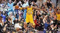 the basketball player is celebrating his team's victory with confetti thrown around him