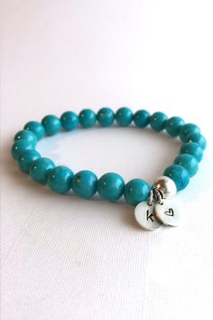 Initial Bracelet, Aqua Blue Beaded Jewelry, Letter Charm Stone Stretch Bracelet on Etsy Personalized Turquoise Beaded Bracelets, Personalized Turquoise Bracelets For Gift, Turquoise Stretch Bracelet As Gift, Hypoallergenic Turquoise Stretch Bracelet Gift, Turquoise Stretch Bracelet As A Gift, Hypoallergenic Turquoise Round Beads Bracelets, Turquoise Bracelet With Polished Beads As Gift, Adjustable Polished Beads Charm Bracelet Gift, Polished Beads Charm Bracelet As Gift