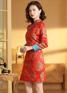 ⭐⭐Traditonal suit for Chinese Spring Festival-Bainian 拜年服； Great New year presents for wife/Mother/Daughters; Premium Quality and Finishing; Very Soft and light weight! ⭐ Perfect for daily leisure or formal events; Design High Lights: Loose Cheongsam hemline; Above knee Hemline to show taller; Vintage Chinese Ancient Royal Pattern; Pockets by two sides; Match tips: For tall people more than 173cm; this dress might be shorter, can match match to tight Pants In White or black /Loose Trumpet pants Traditional Ceremonial Dress For Spring, Traditional Ceremonial Spring Dress, Traditional Long Sleeve Red Cheongsam, Festive Fitted Cheongsam With Long Sleeves, Red Cheongsam For Spring Festivals, Traditional Long Sleeve Dress For Tea Ceremony, Red Cheongsam For Spring Festive Occasion, Festive Red Cheongsam For Spring, Festive Long Sleeve Embroidered Cheongsam